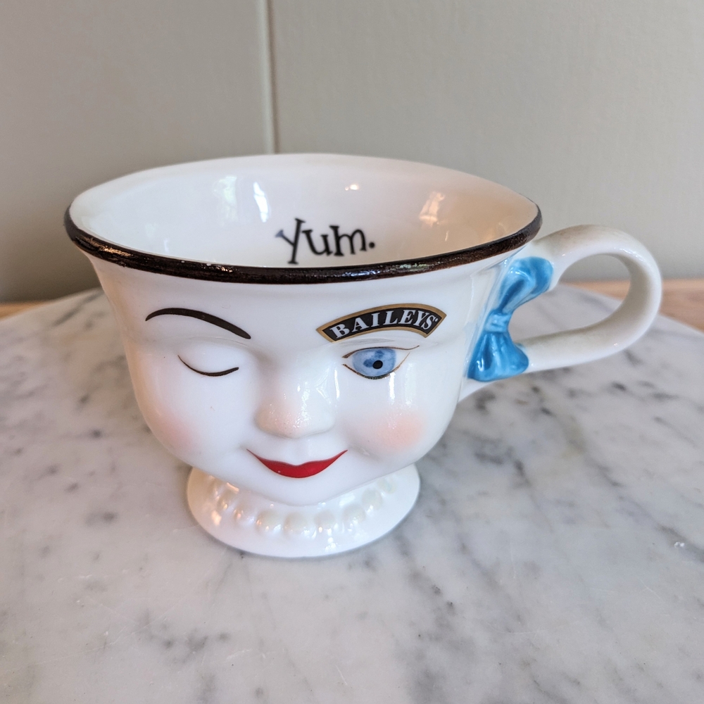 Baileys Winking Face Mug with Blue Bow